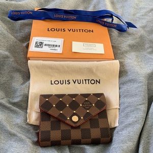 Louis Vuitton Victorine wallet w/ studs